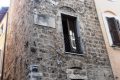 "C'è la peste": il vescovo sale in cima a Torre Barbarasa